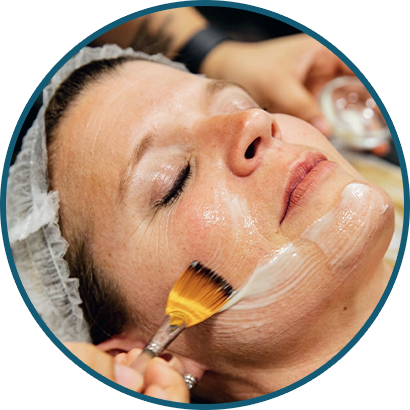 woman lying down with facial treatment